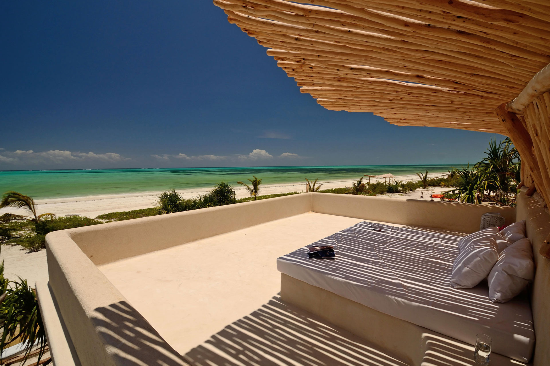 A stargazing bed with endless views of the beach at a private villa at Zanzibar White Sand Villas in Zanzibar.