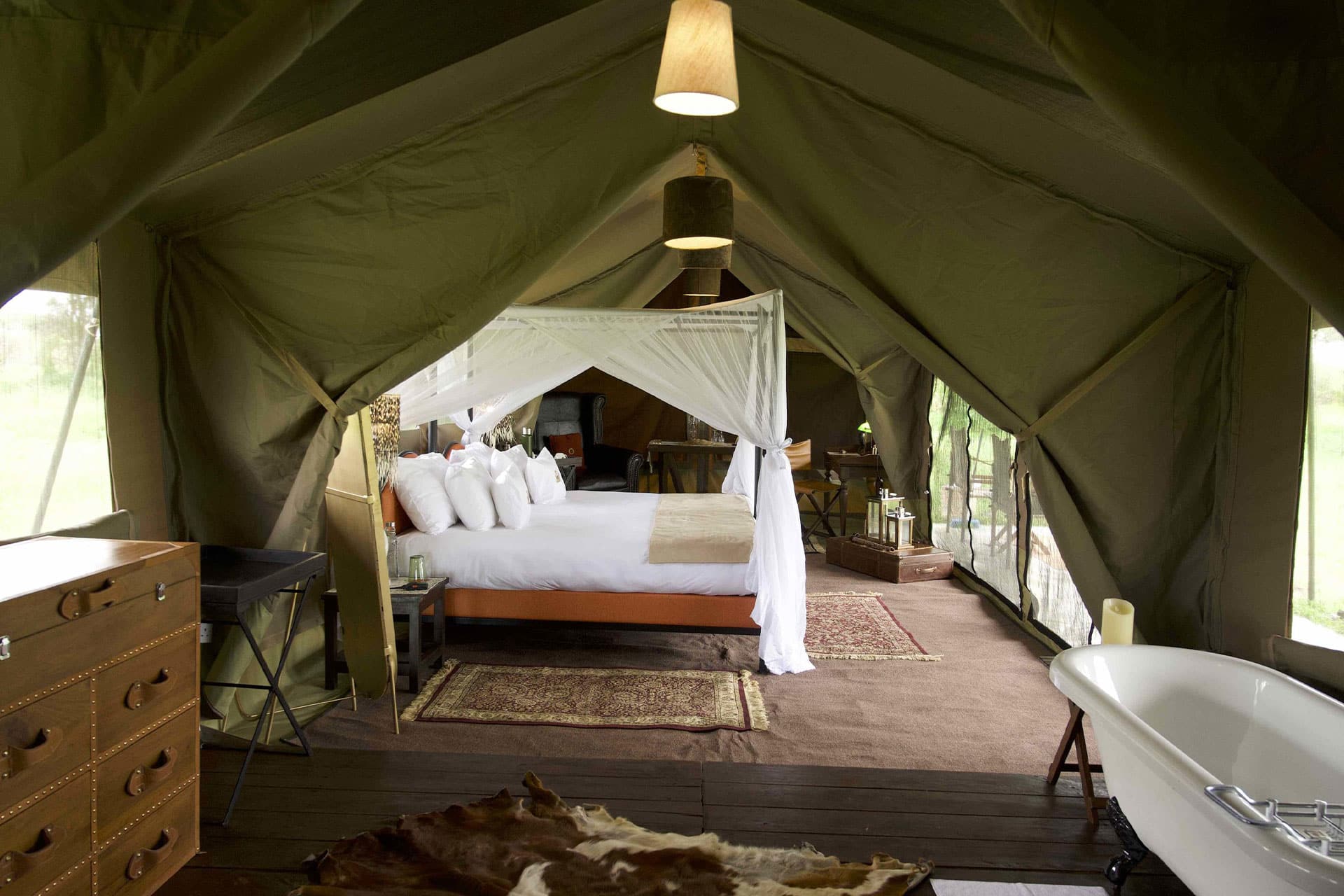 An interior of a tent at the Royal Migration Camp – a top choice for a slow safari in East Africa.