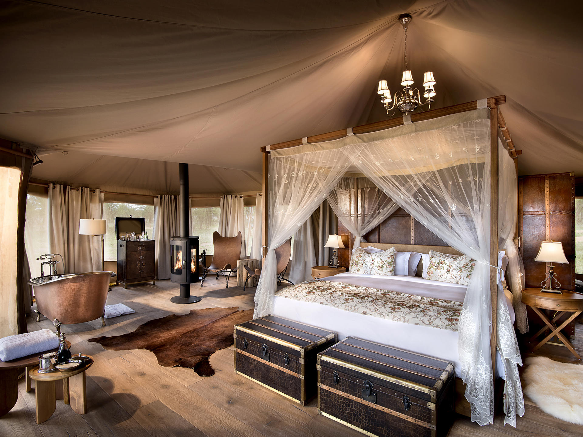 Luxury tent bedroom at One Nature Nyaruswiga, Serengeti National Park - a perfect place to spend christmas in East Africa.