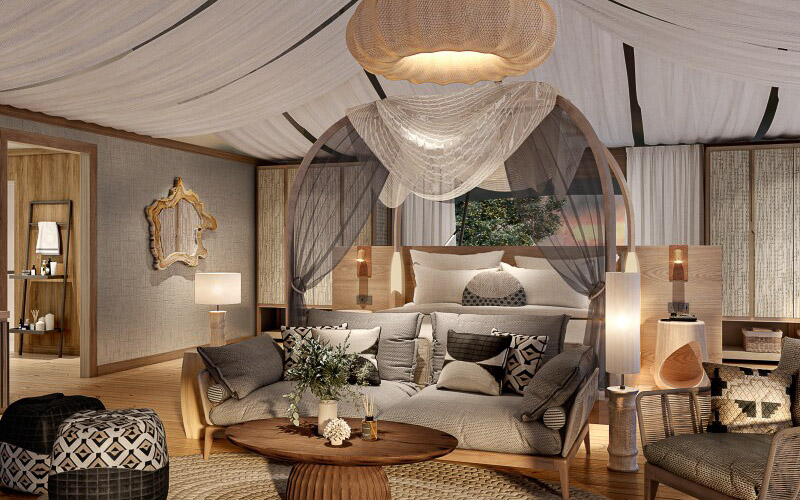 Interior of an opulent tent bedroom at JW Marriott Masai Mara Lodge – one of the new African luxury resorts opening in 2023.
