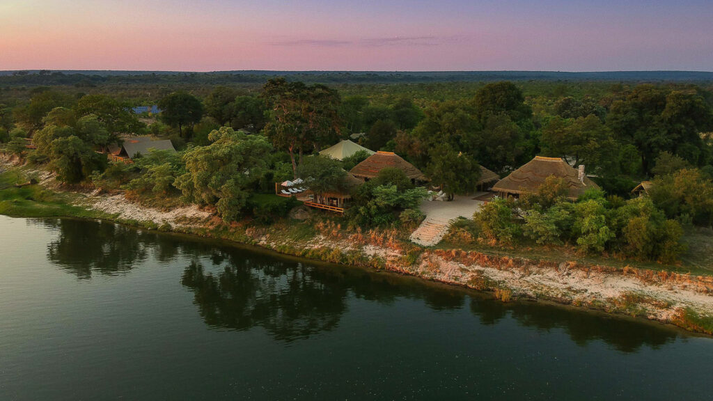 Mpala Jena located on the banks of the Zambezi River as the sunsets with Grand Africa Safaris