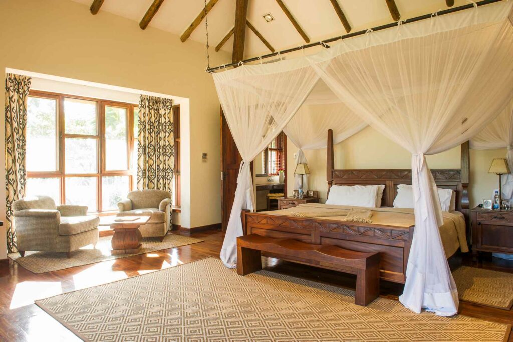 a master bedroom in a cottage at Legendary Lodge
